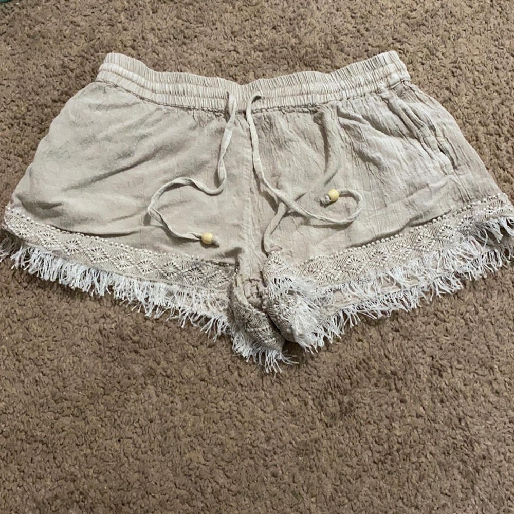 Rays Sun shorts with trim, fringe and drawstring.